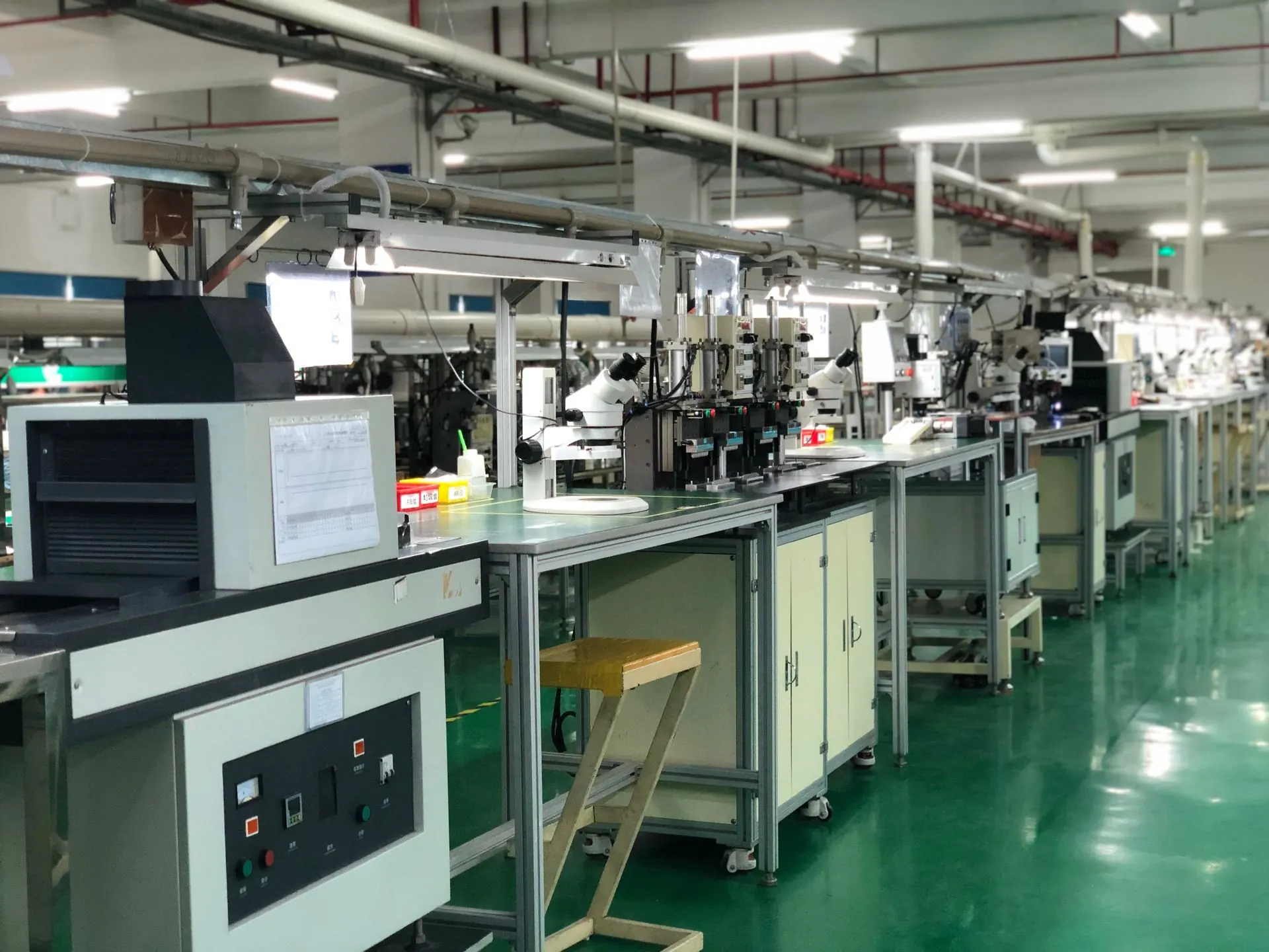 Production line scene showing station workflow and equipment layout (IMG_4586)